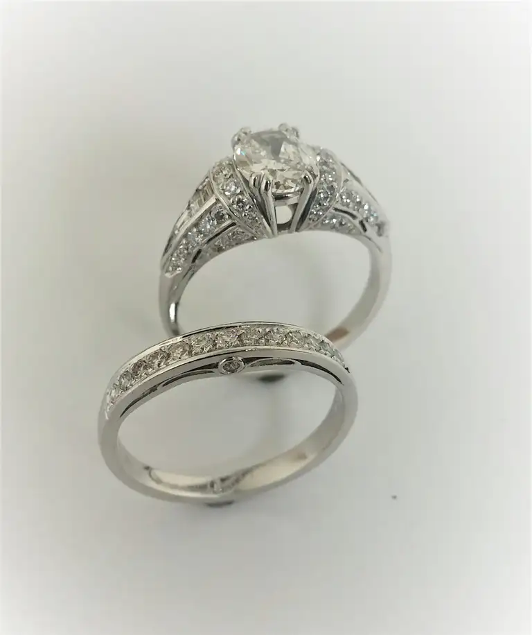 Custom oval engagement ring and matching wedding band set