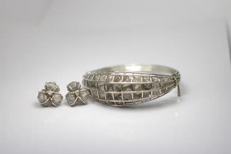 Cage bracelet and matching earrings, remodelled in the atelier